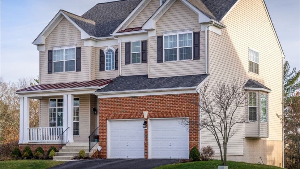 Tan House with Brown Garage