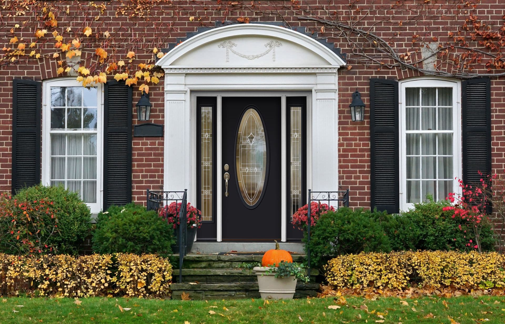 Brick home with black front door