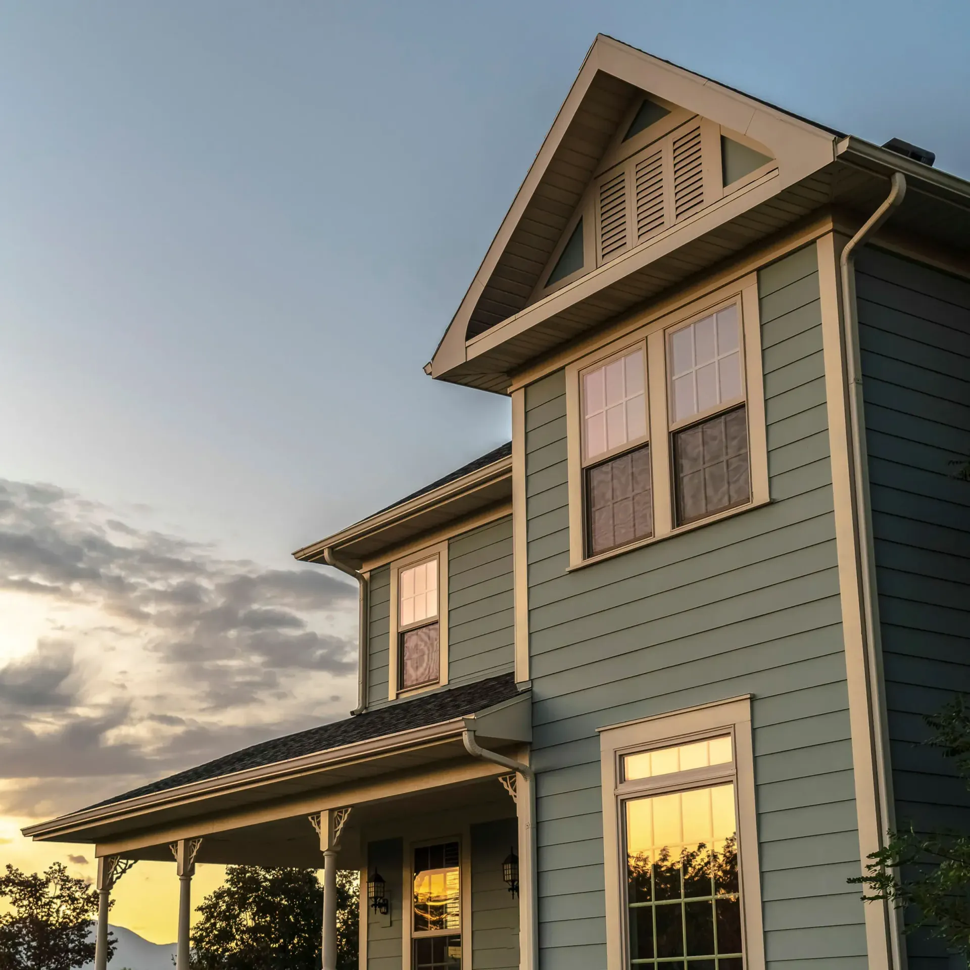 Home with siding during sunset